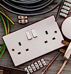 a white switch and wires on a table 